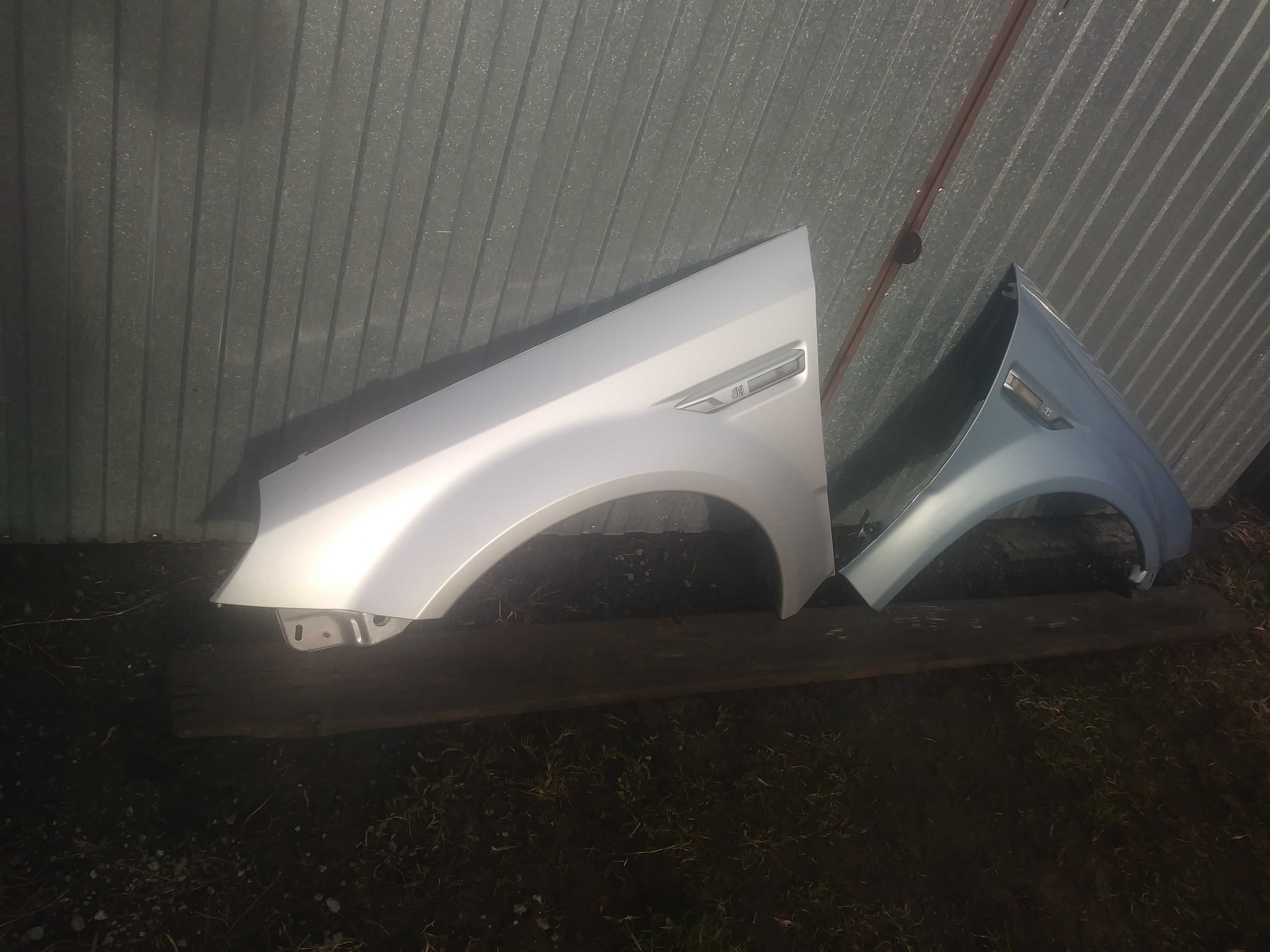 Opel Tigra 2 II Błotnik lewy przód srebrny Z157 prawy Z21C