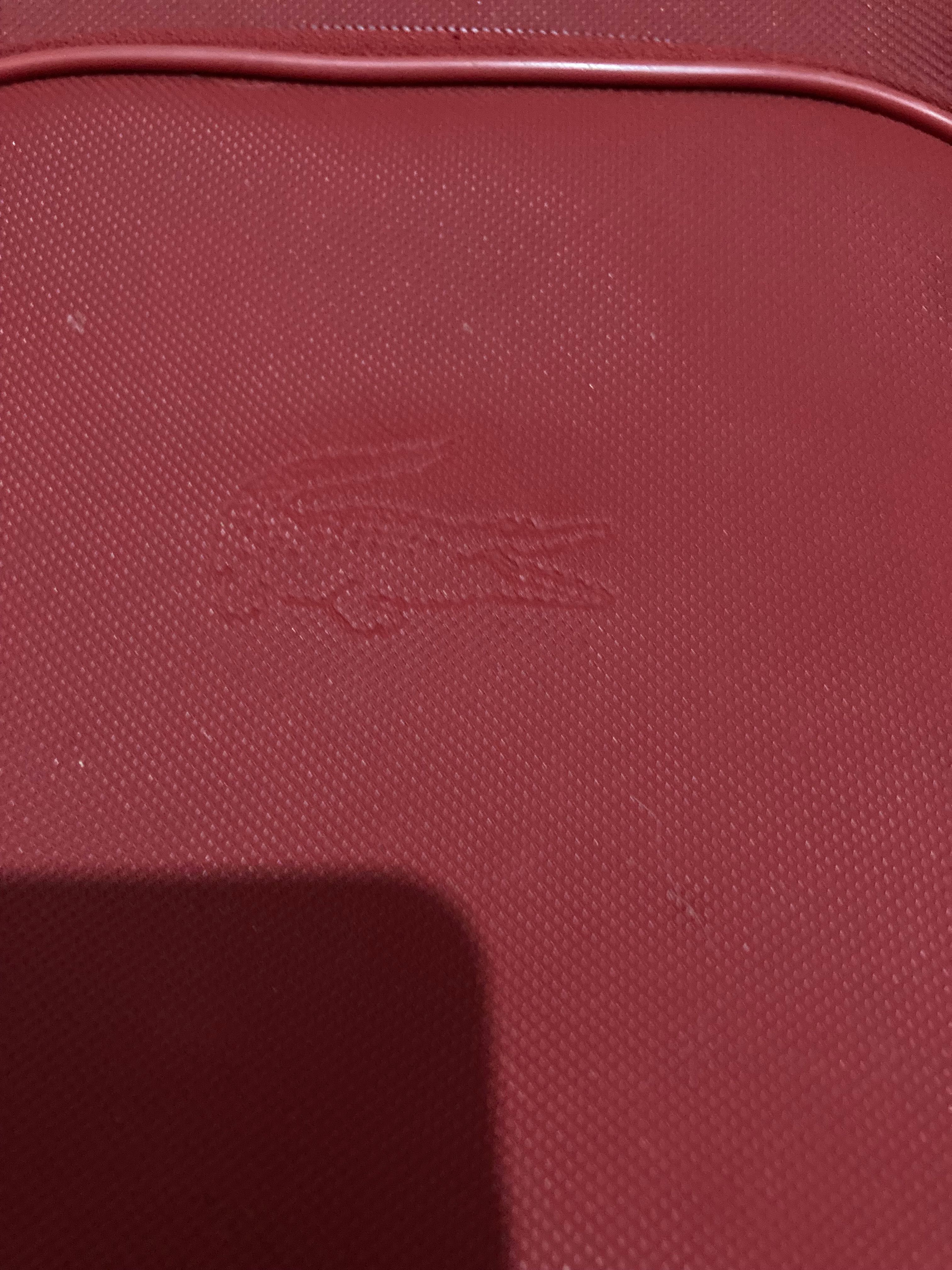 Malas lacoste vermelhas