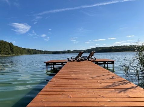 Rentyny Place4You. Dom nad jeziorem z prywatną plażą i balią. WAKACJE