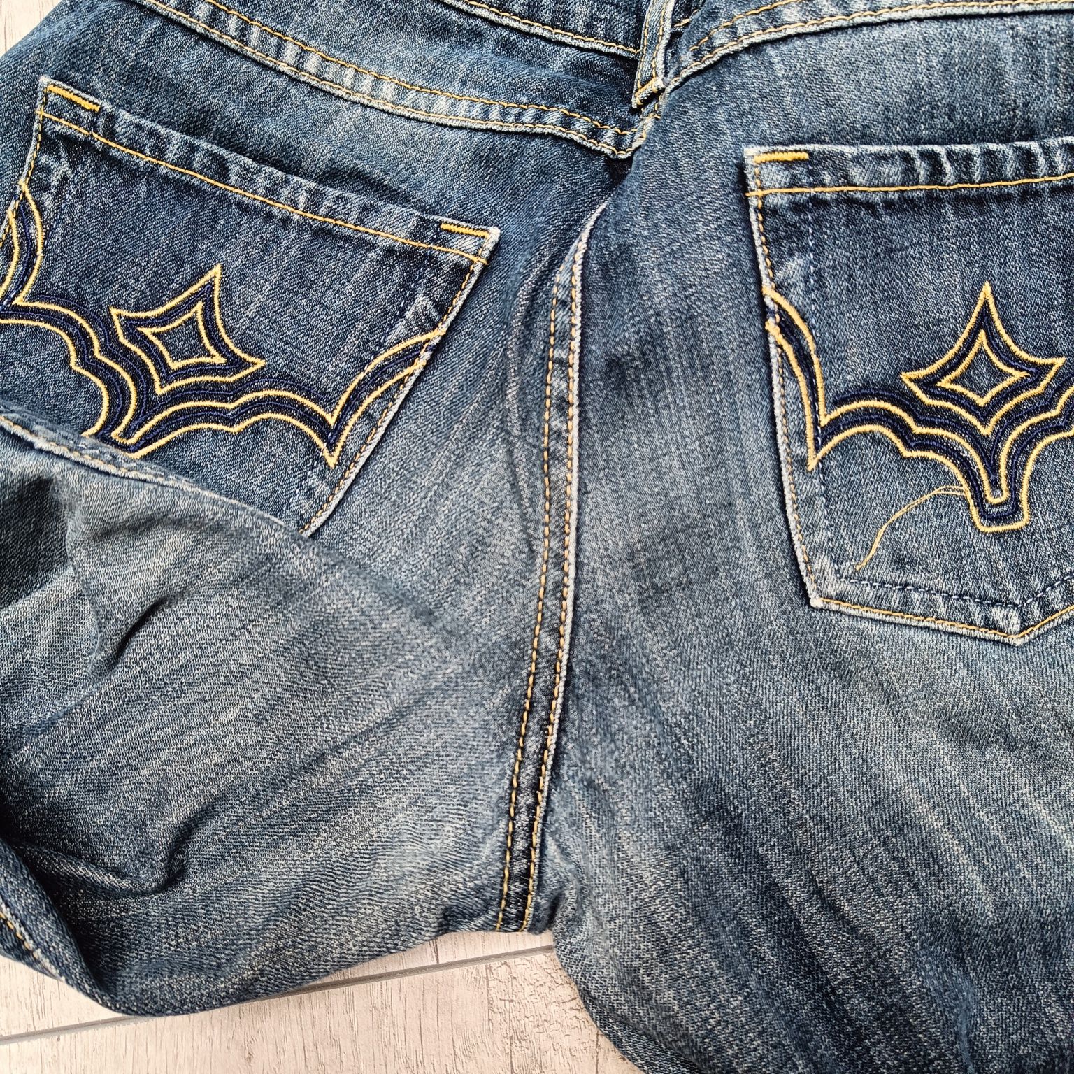 Niebieskie spodnie jeansowe damskie, dżinsy Deep, rozm. 38 / M [29/32]