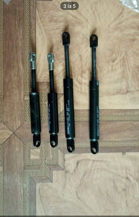 Тріщотка механізму натягу тента та амортизатори