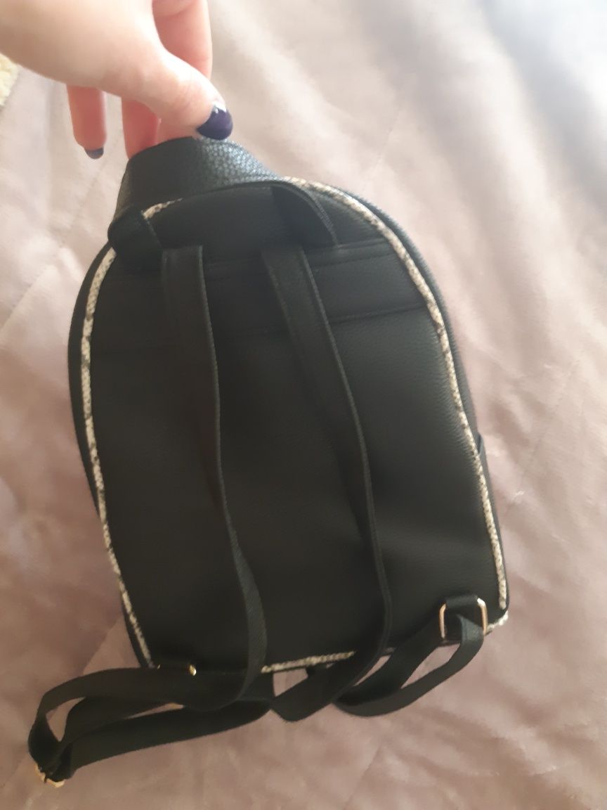 Mochila cor de rosa claro e preto