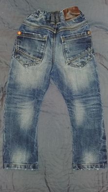 92 NEXT spodnie slim dżinsowe jeans modne przetarcia