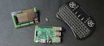Raspberry Pi Model B+ v1.2 + Prototyping Pi + myszka + karta 32GB