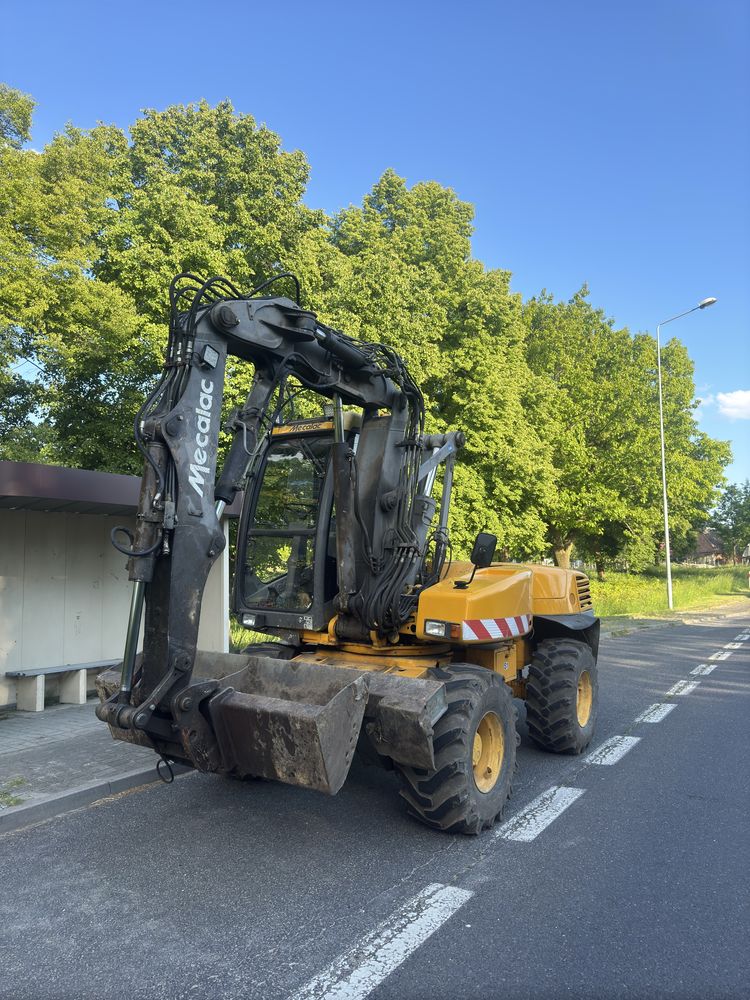 Usługi Koparka Mecalac i Koparko Ładowarka, Usługi Ziemne Wyburzenia