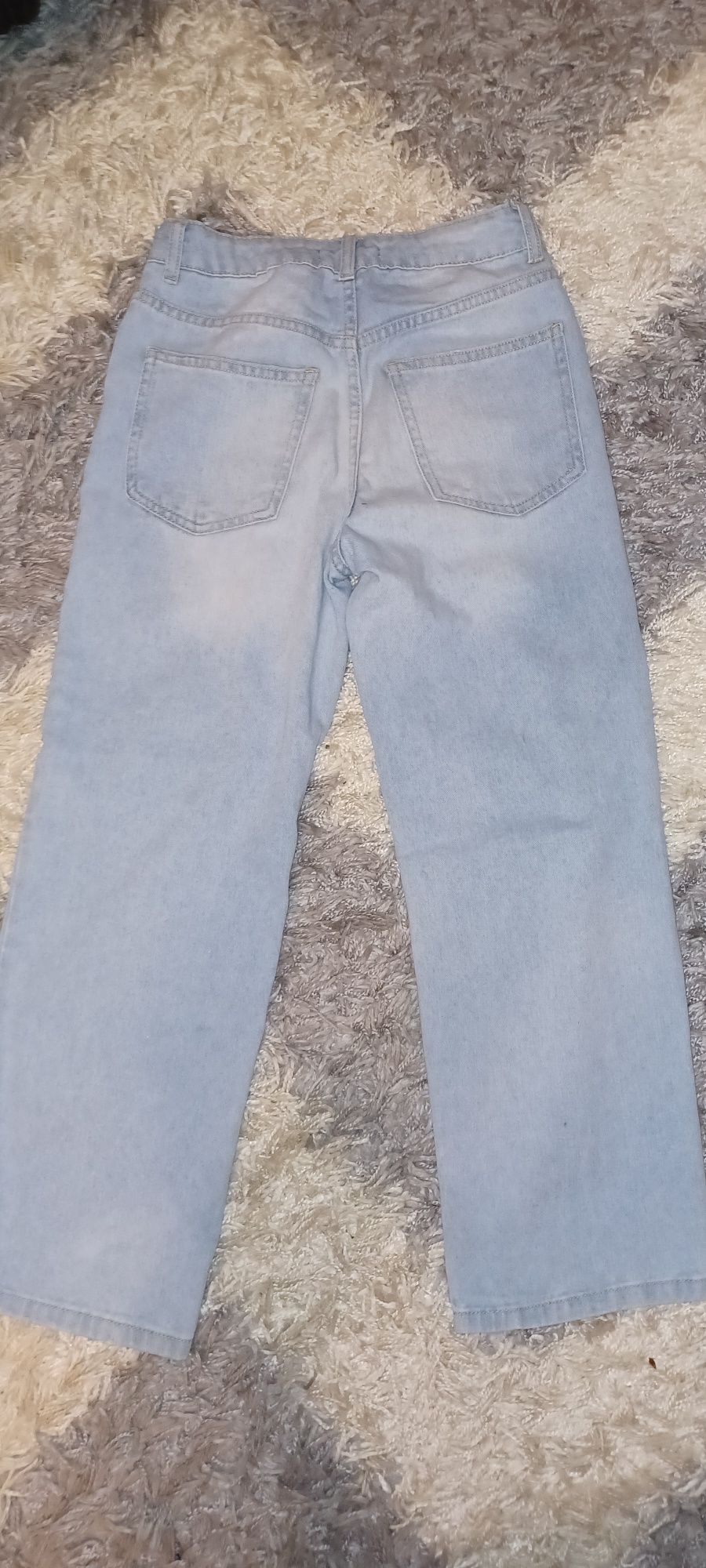 Spodnie jeansy z dziurami r.146 Reserved