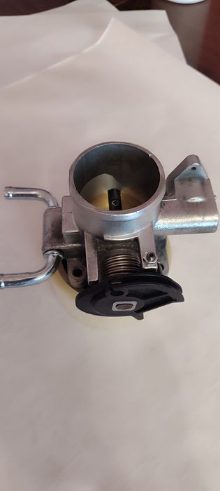 Дроссельная заслонка Chevrolet Aveo.  Шевролет Авео 1.5