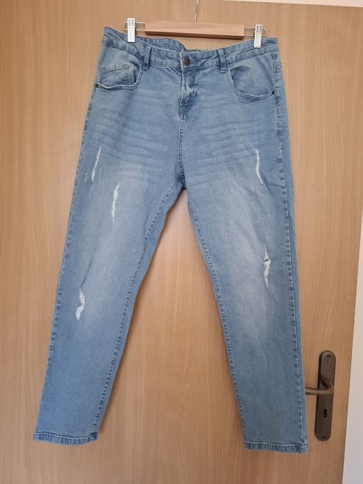 Spodnie jeansowe rozm. 44 z dziurami