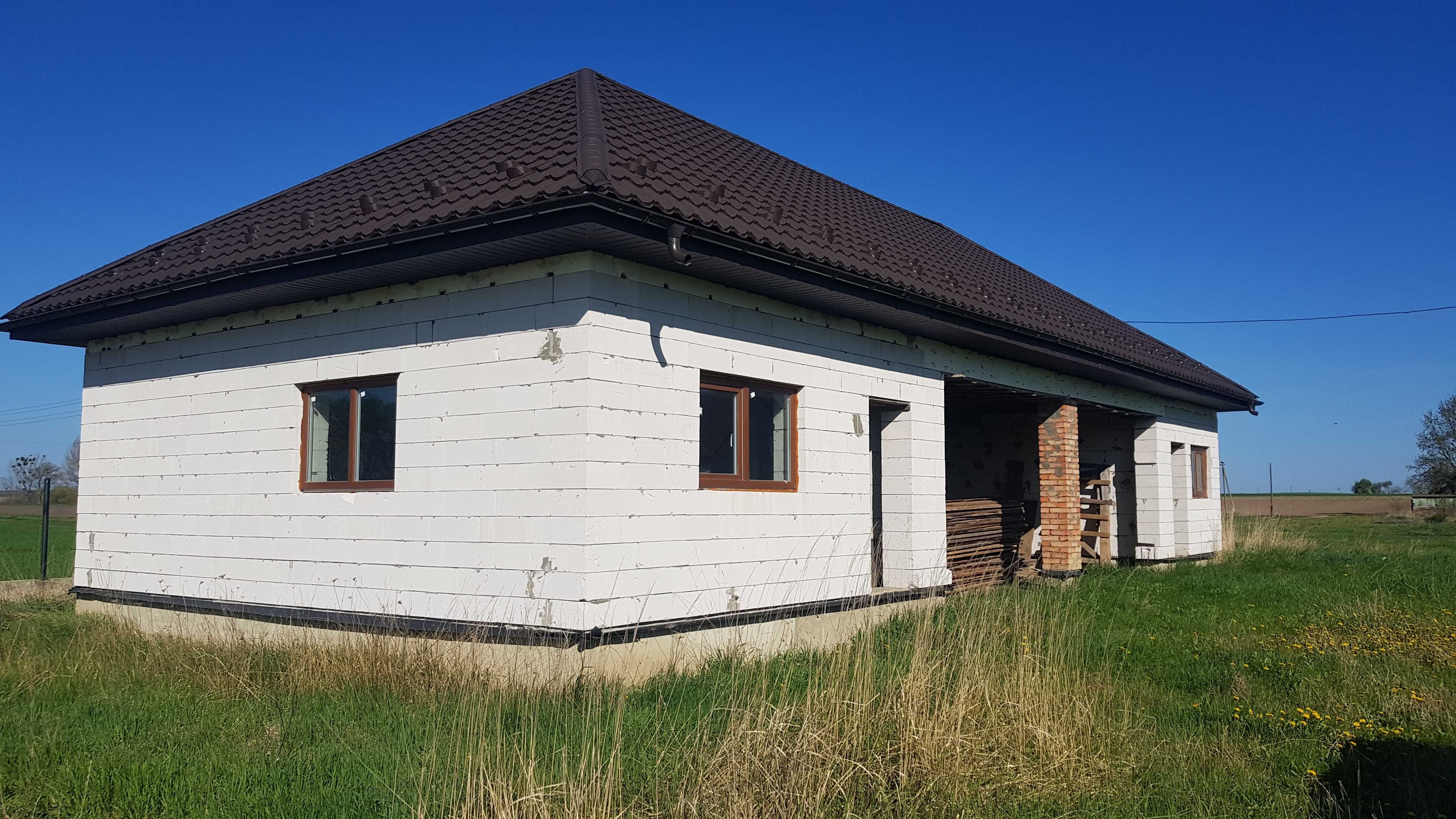 Земельну ділянку з незавершеним будівництвом