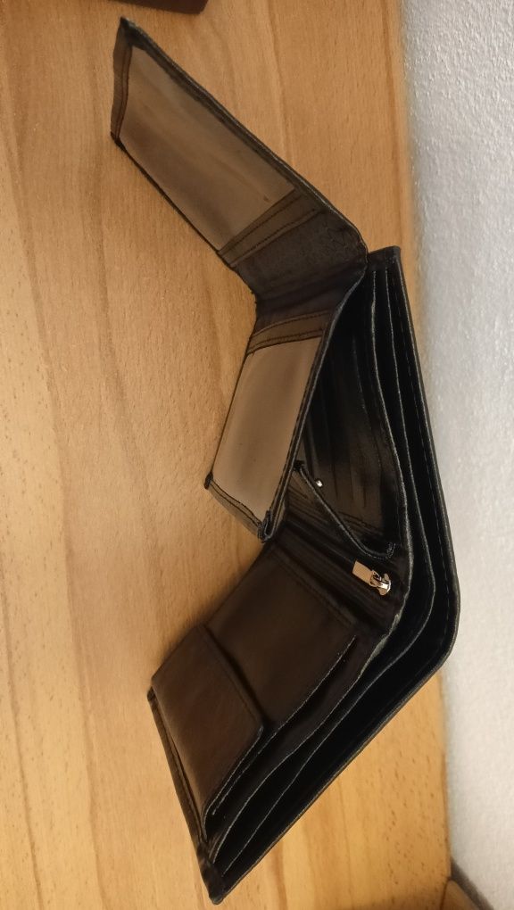 Pojemny nowy czarny męski portfel skórzany 14x10 cm