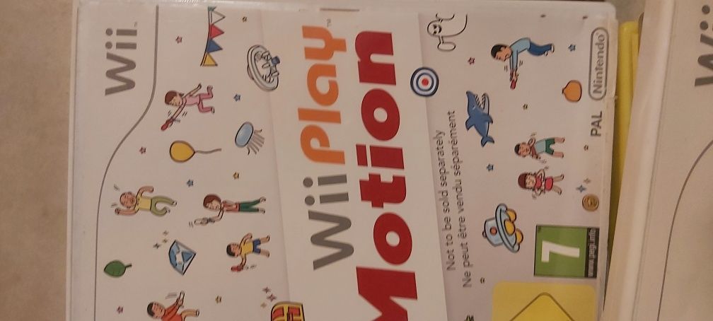 Nintendo Wii com comandos e jogos