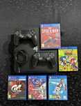 Ps4 PRO 1T, 2 comandos, 5 jogos