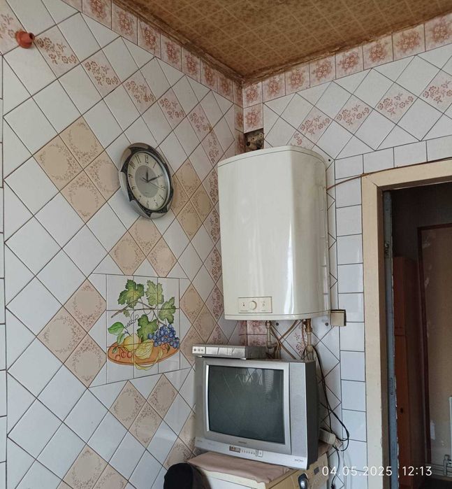 Продам.. 1/2 дома в Мерефе район вокзала.