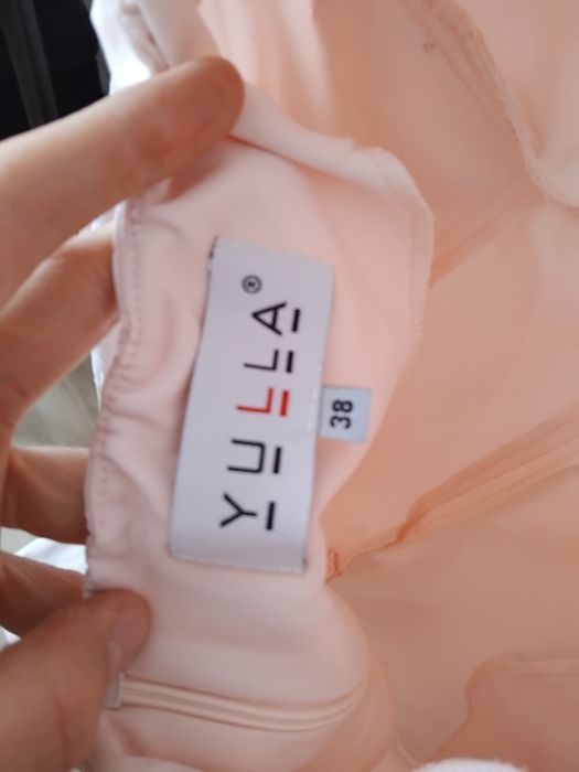 Kombinezon Yulla M jasny różowy pudrowy roz elegancki