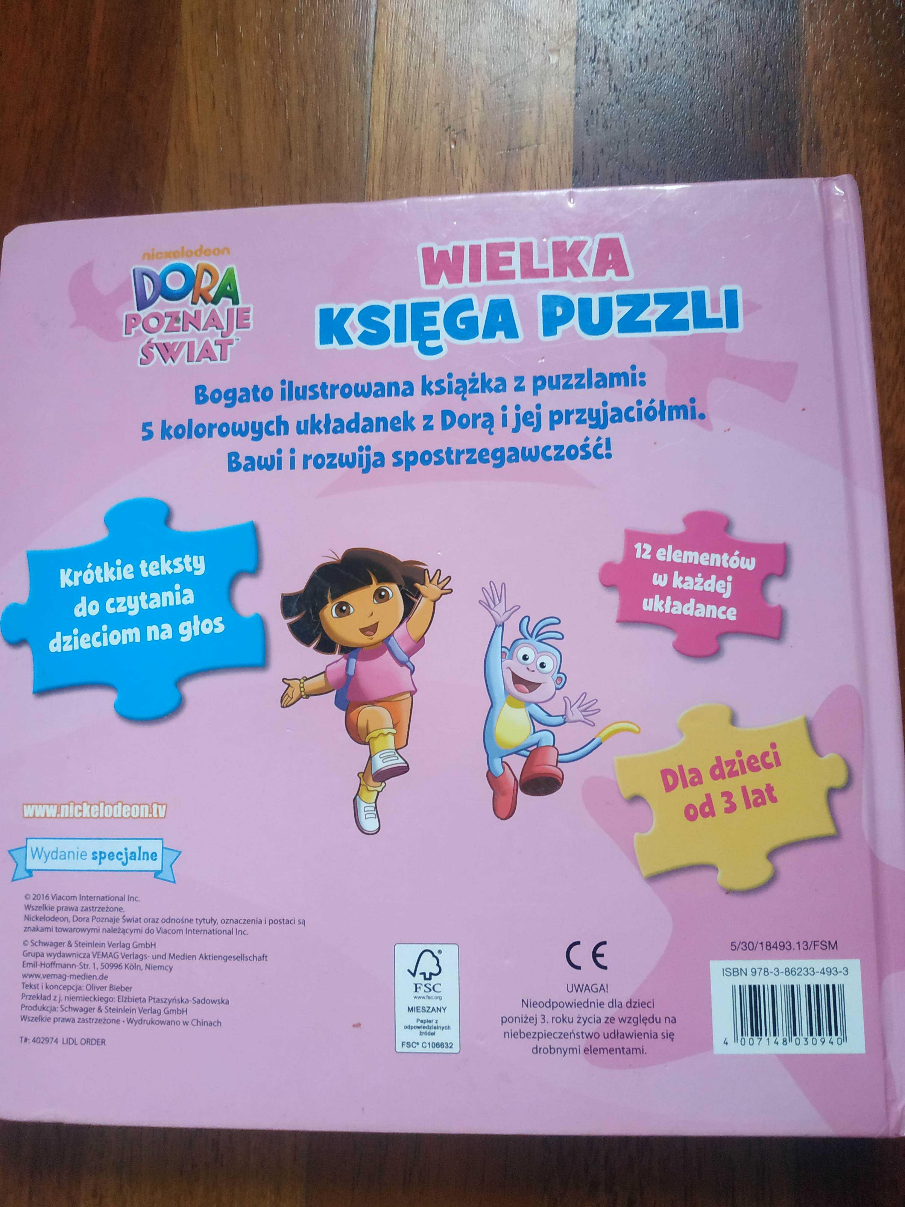 Zabawki Dora poznaje świat lalka telefon puzzle