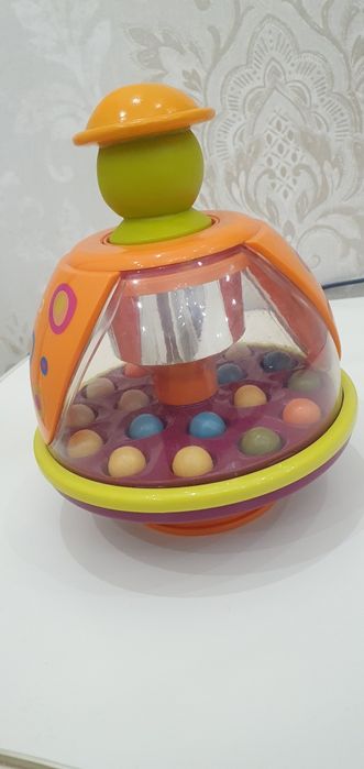 Игрушка Юла мандаринка дзига Battat