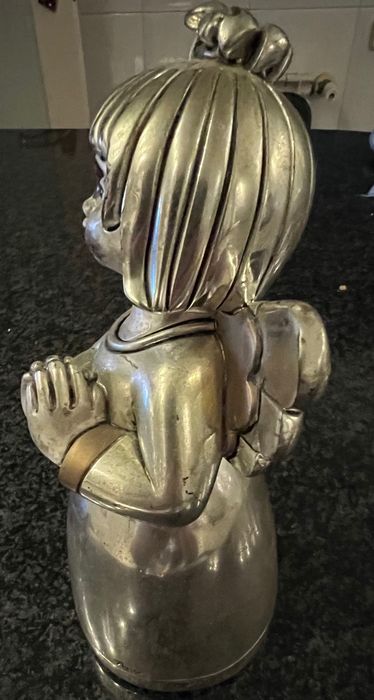 Vendo estátua banhada a prata