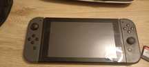 Nitendo switch   plus 2 gry, pad