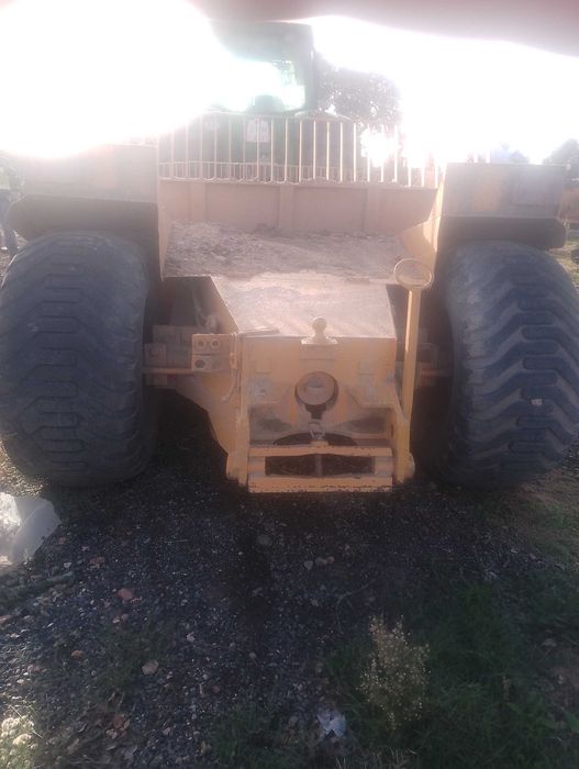 Trailla niveladora transportadora