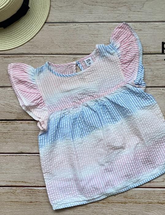 Jaskrawo prążkowana koszulka dla dziewczynki  110