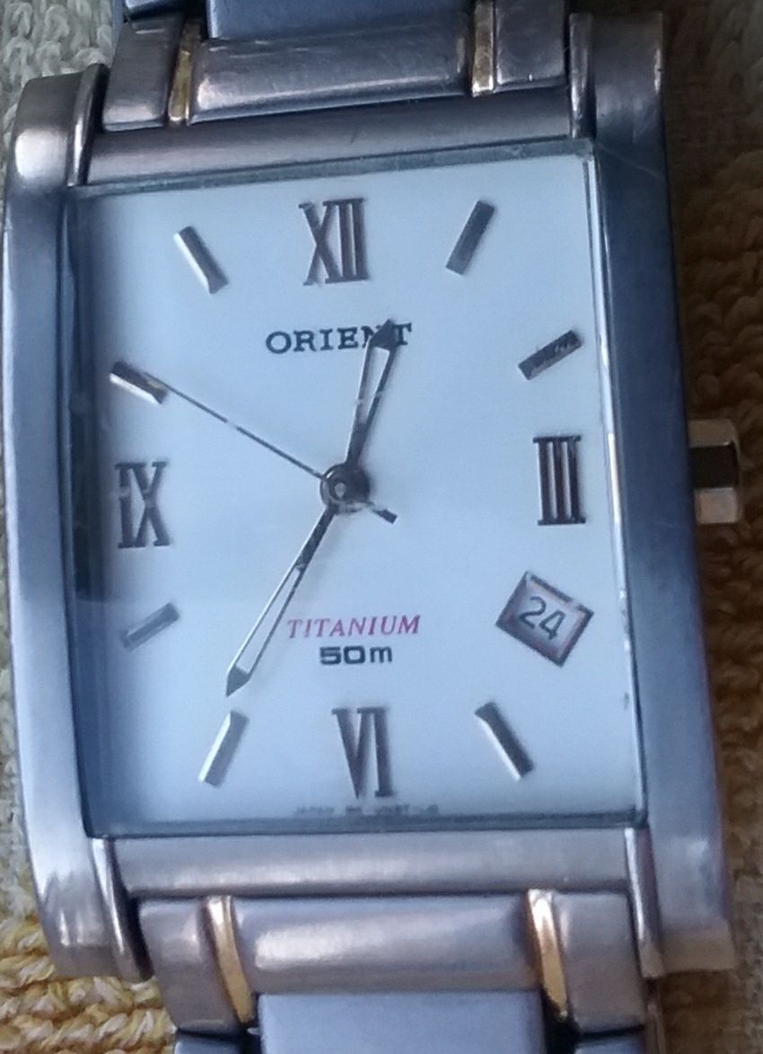 Мужские часы Orient titanium.