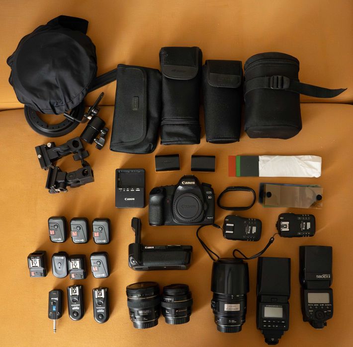 Canon 5D Mark II + 20mm 2.8 +  50mm 1.4 + 70-300mm +Speedlite 580EX II