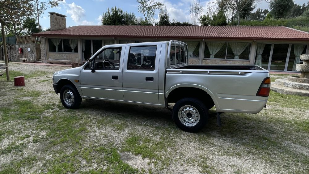 Pick-up Opel Campo cabine dupla+caixa aberta 4x2 motor Isuzo 2.5