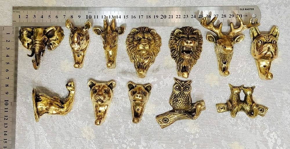 Продам вешалку из бронзы или латуни. Крючки.Жираф,лев, носорог
