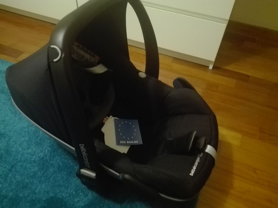 Carrinho de bebé e baby coke