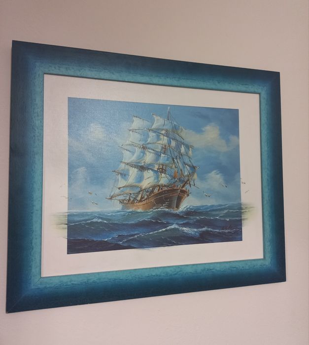 Obraz marynistyczny w ramie.