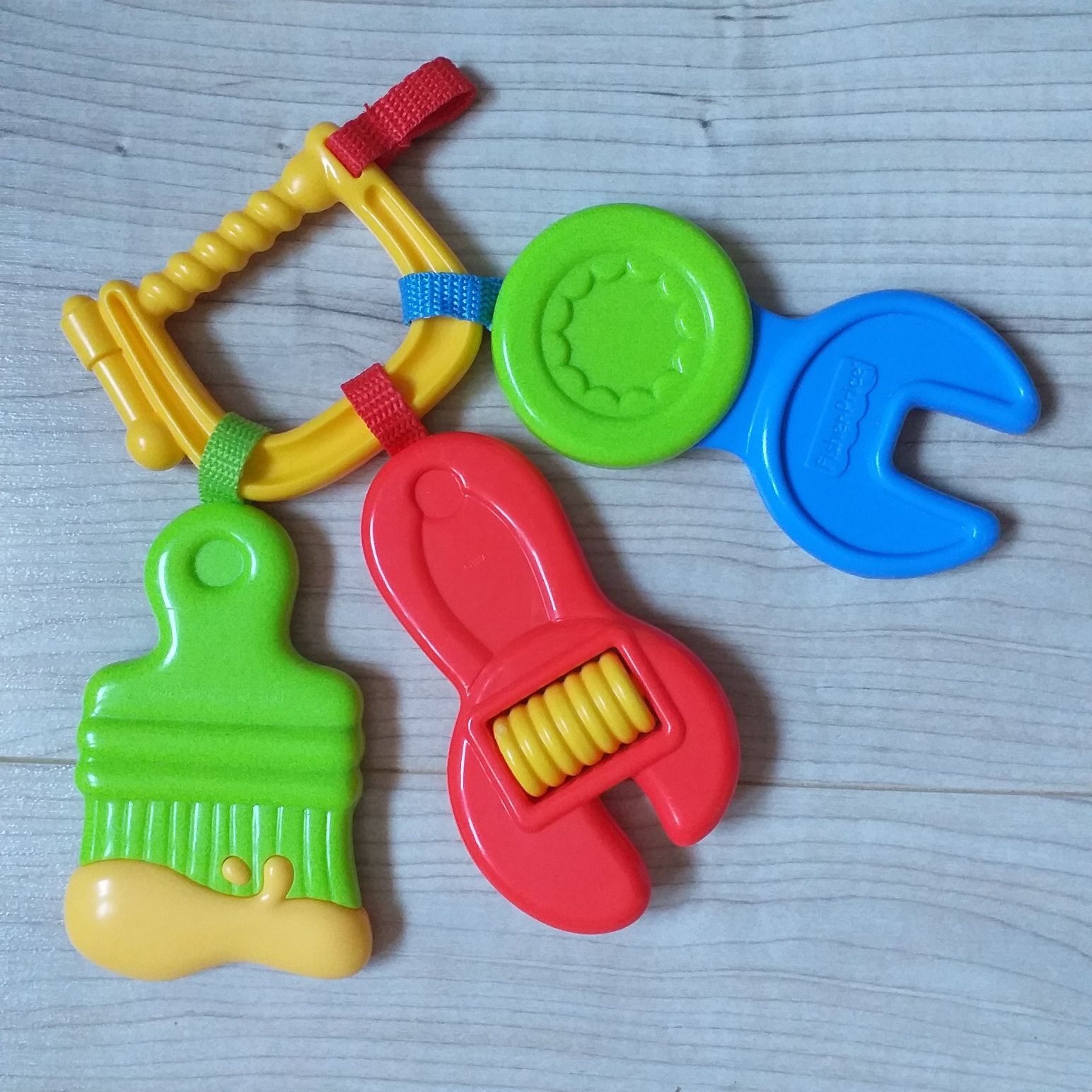 Zestaw zabawek manipulacyjnych Fisher Price gryzak-narzędzia i Flaming