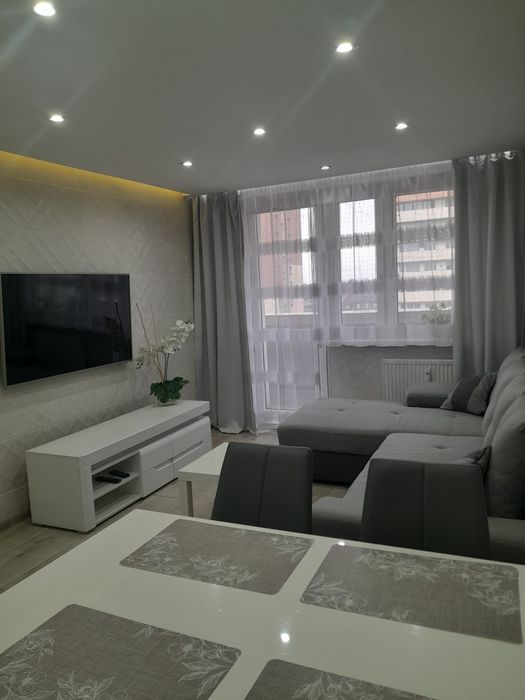 Mieszkanie dwupokojowe z dodatkowym pomieszczeniem oraz balkonem