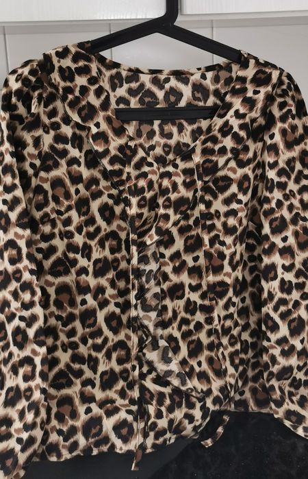 Blusa tigresa de manga comprida