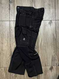 Meskie spodnie Robocze MASCOT RONDA CURDURA wiszącymi kieszeniami 46