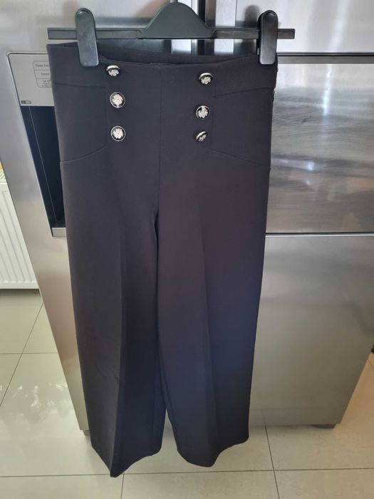 Sprzedam paczkę 10 par spodni roz. 36