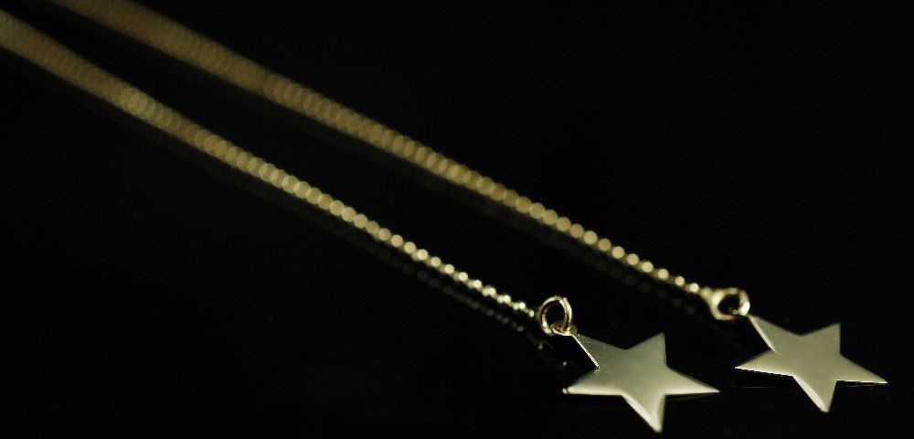Złoto 585-złote kolczyki przeciągane z gwiazdkami