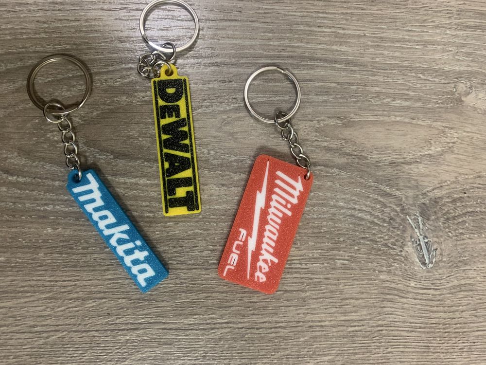 Брелки з логотипом Milwaukeе, DeWalt, Makita,BOBCAT, Ryobi