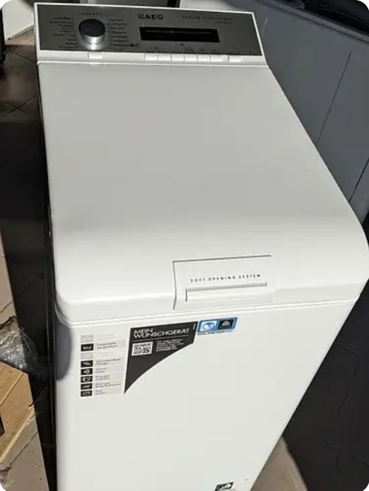 Вузька пральна машина AEG L74270 на 7kg Вертикальне завантаження