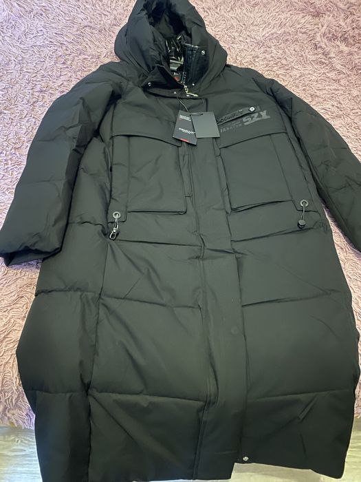 Зимова довга куртка