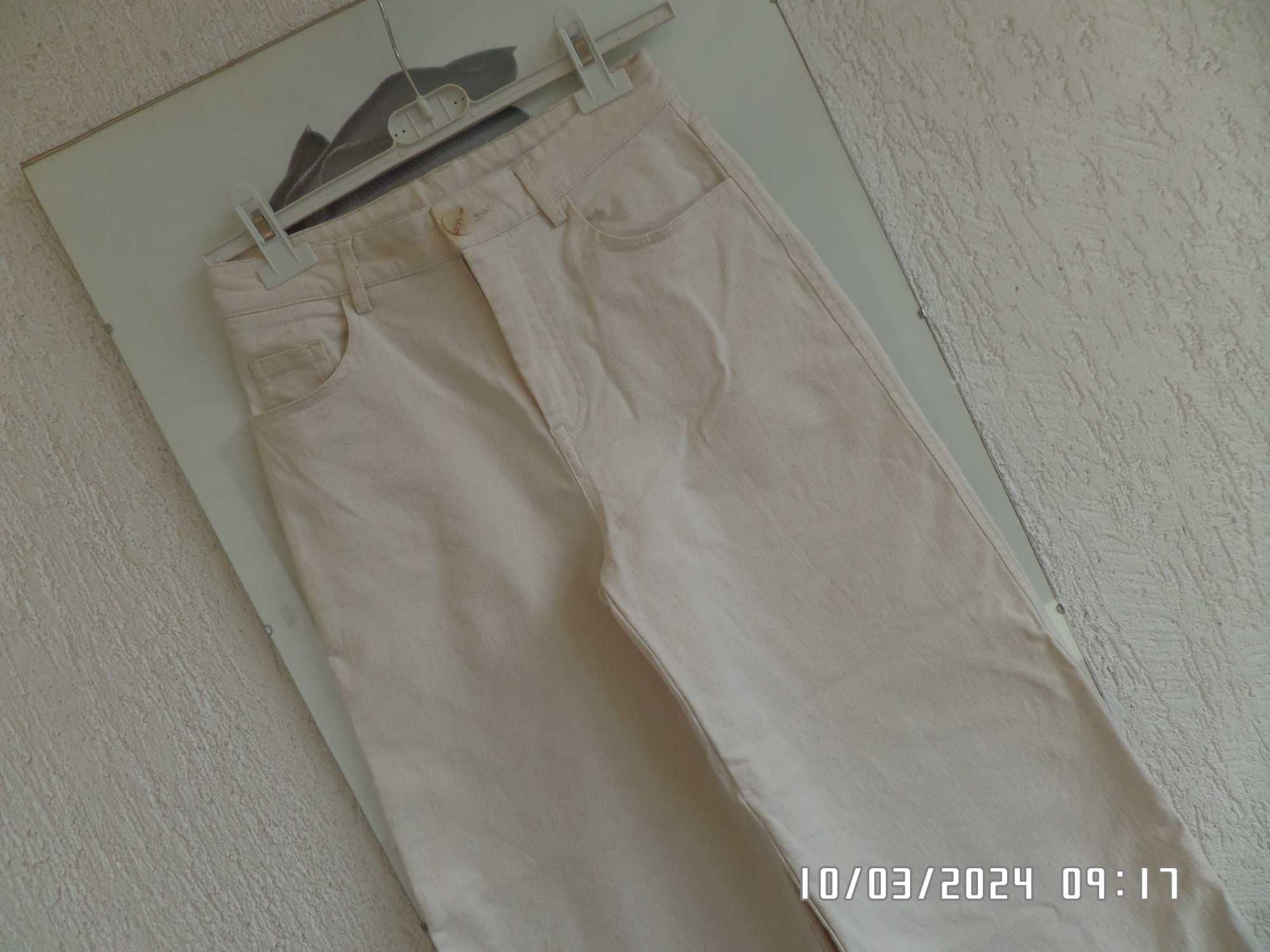 Hit sezonu .H&M szerokie nogawki  spodnie jeansy   creme x/s