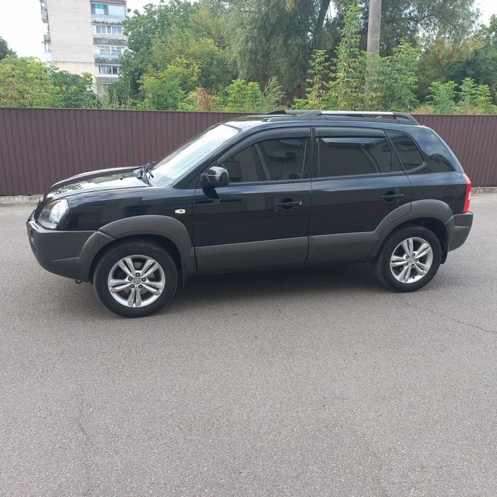 Hyundai Tucson, I покоління  2.0 DOHC МТ (142 к.с.) 4WD  Base