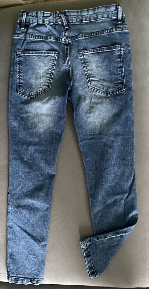Spodnie chłopięce jeans Reserved