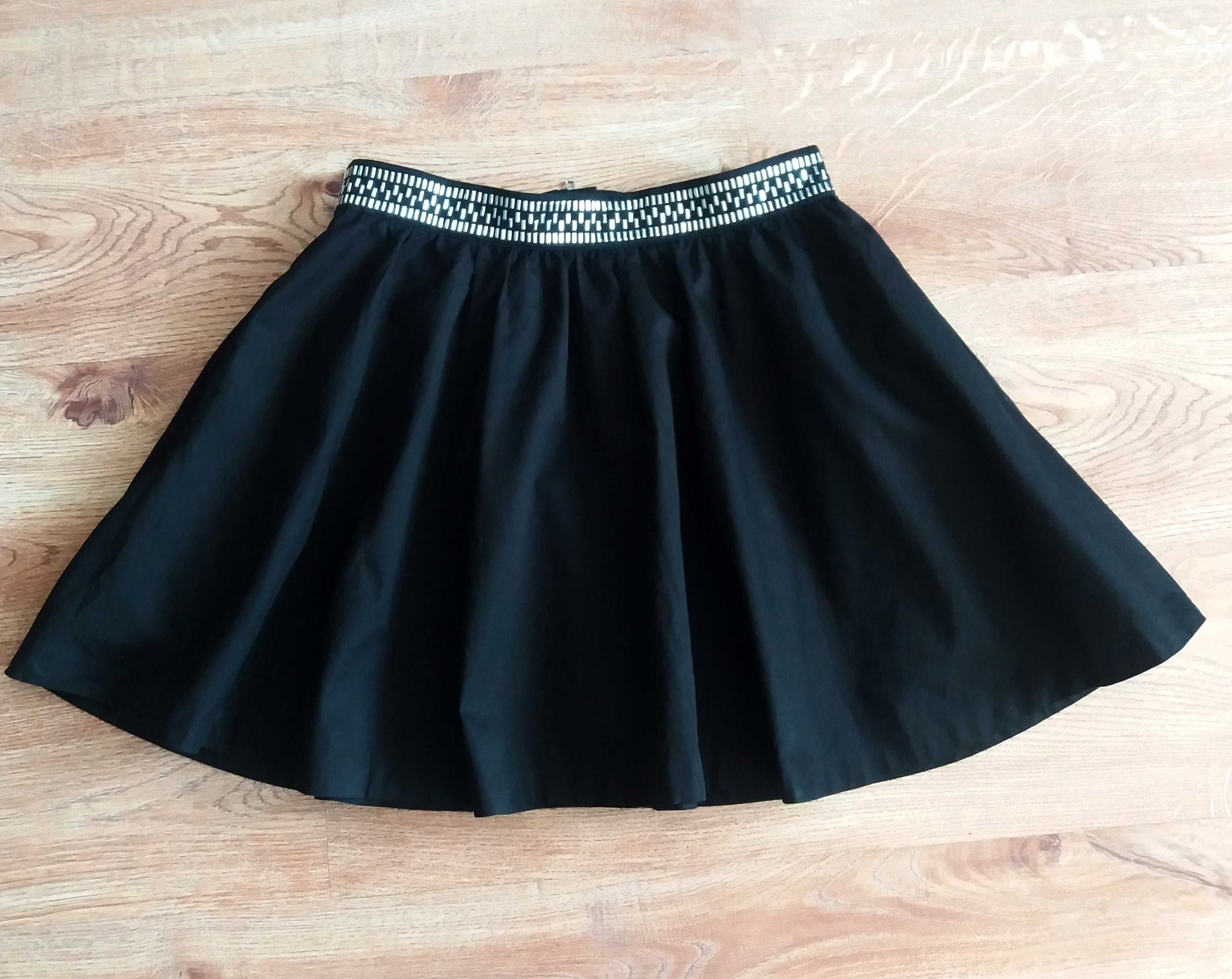 Rozkloszowna spódnica mini z kieszeniami H&M rozmiar 40