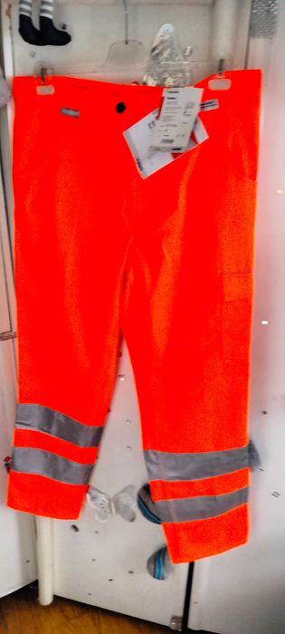 Nowe spodnie robocze ochronne ostrzegawcze pomarańczowe Planam