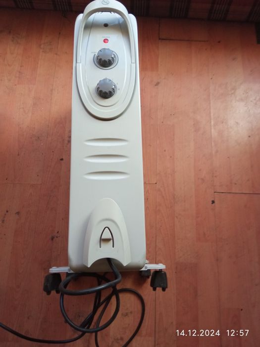 Продам масляный обогреватель CELCIA YANO1-9 2000W 8 секций обогрева