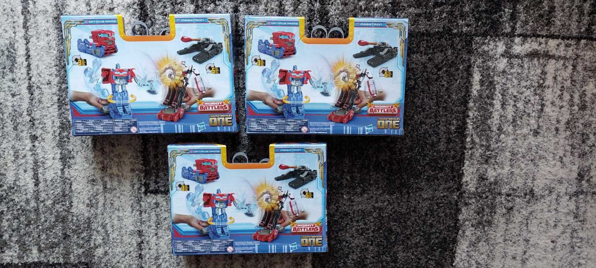 Hasbro Transformers One - Figurki Optimus Prime vs Megatron, nówka!