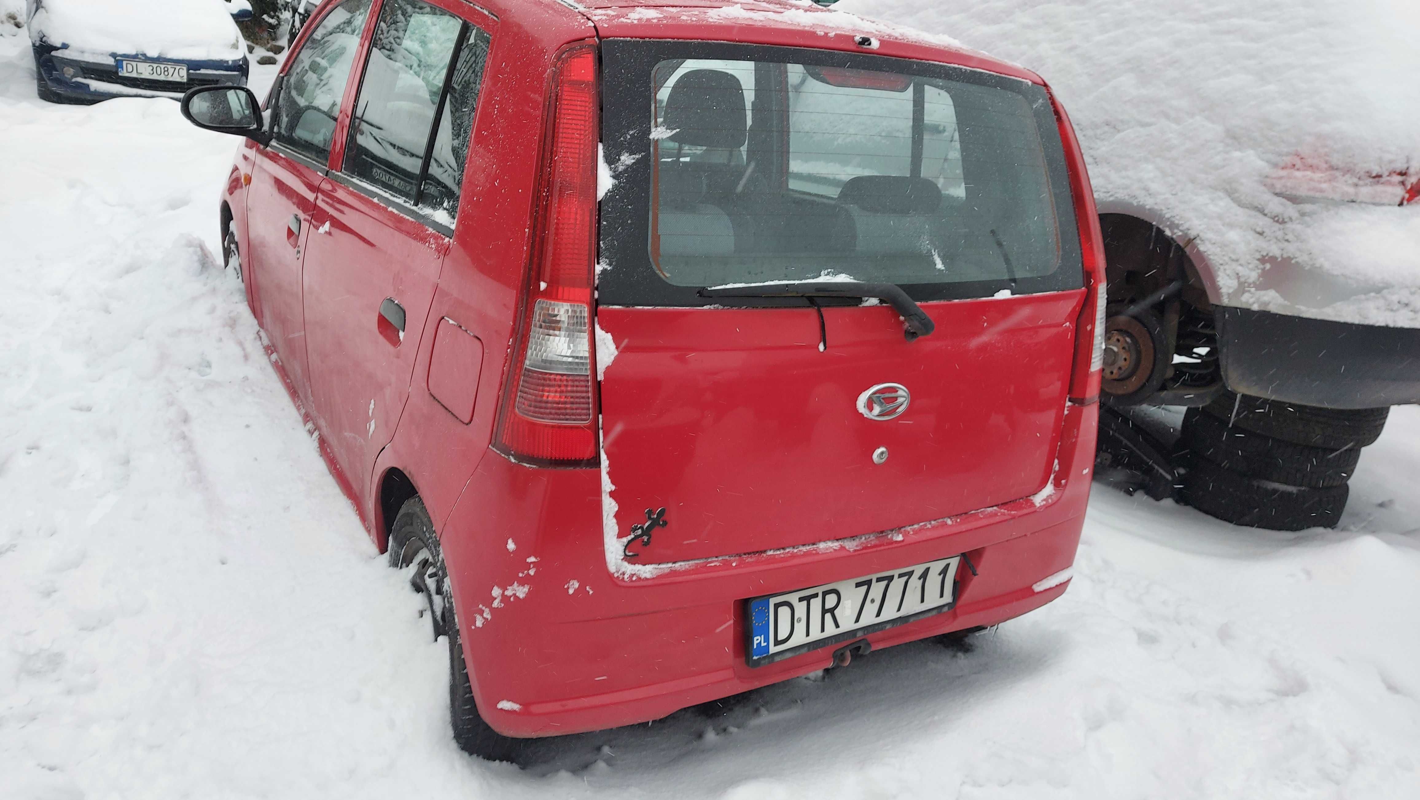 Daihatsu Cuore VI R29 zderzak tylny czerwony 5d FV części/dostawa