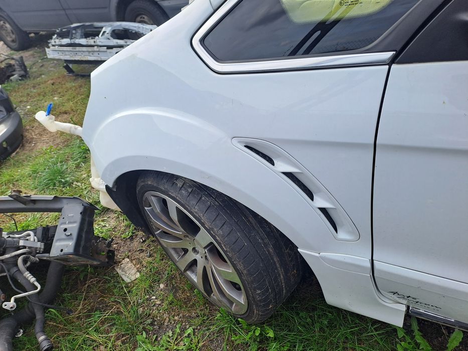 Błotnik lewy Ford S-Max mk1 lift Titanium w kolor F7