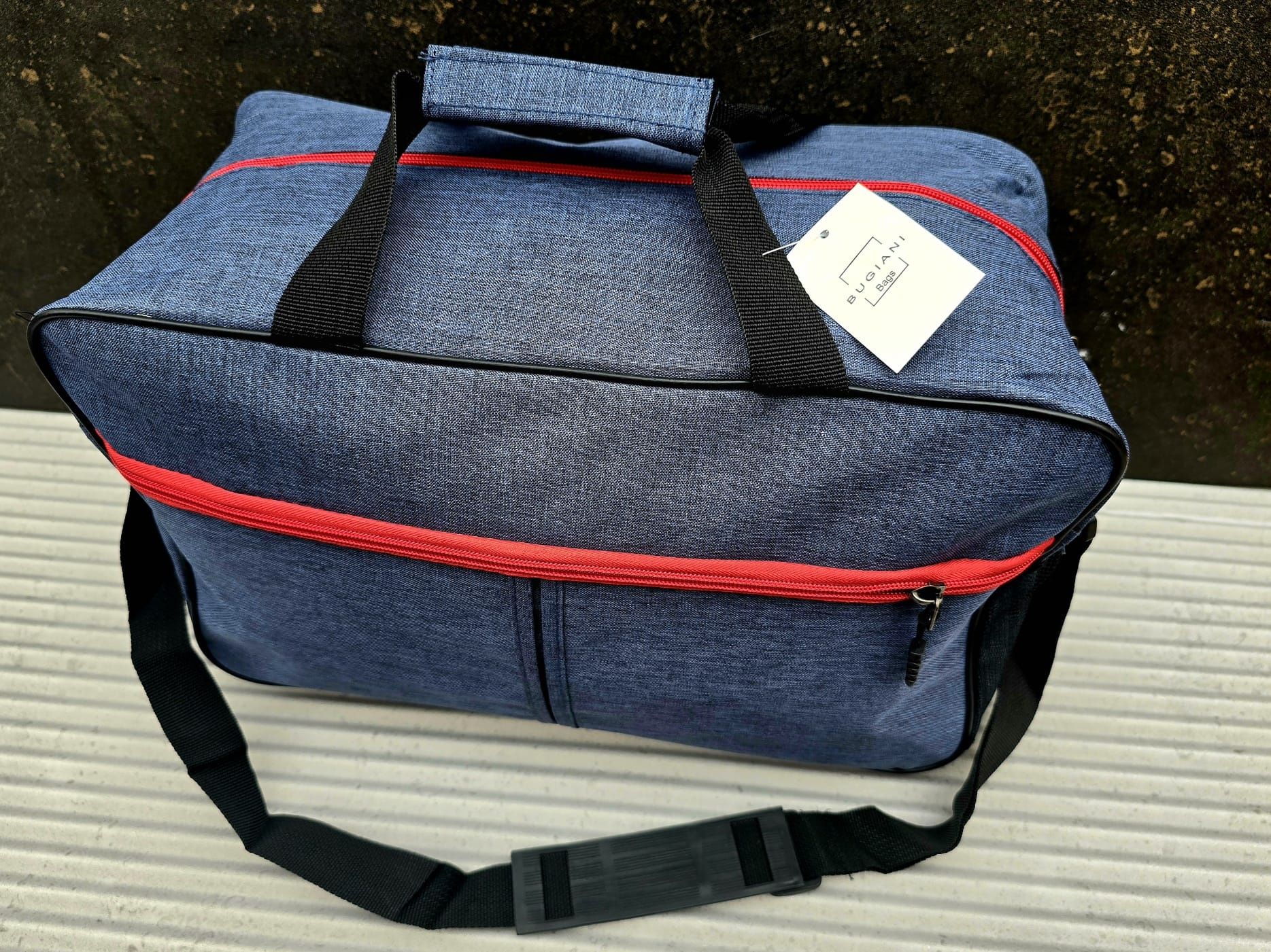 Bugiani niebieska torba podróżna bagażowa nowa czerwony zamek