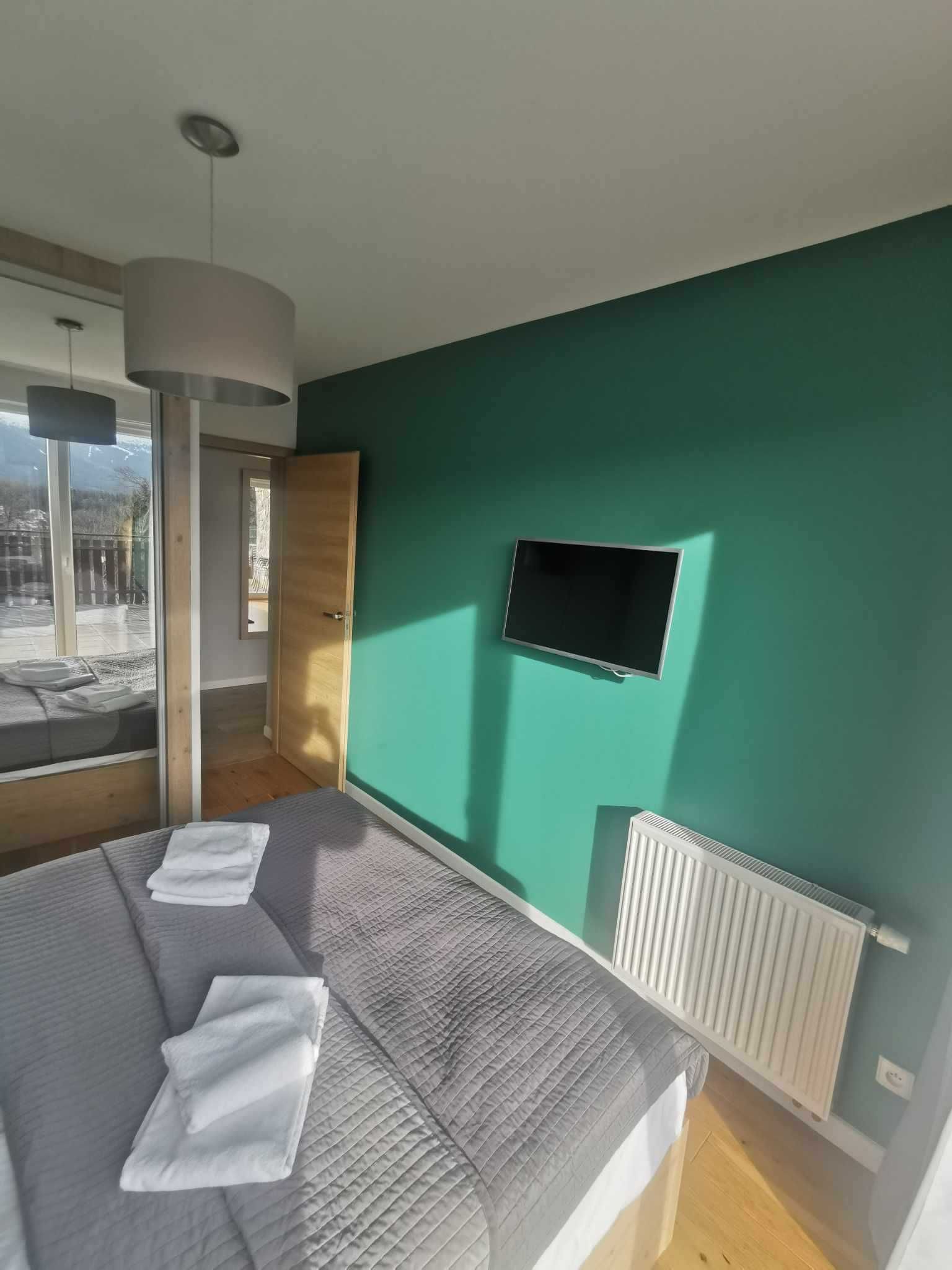 Apartament z tarasem i pięknym widokiem.